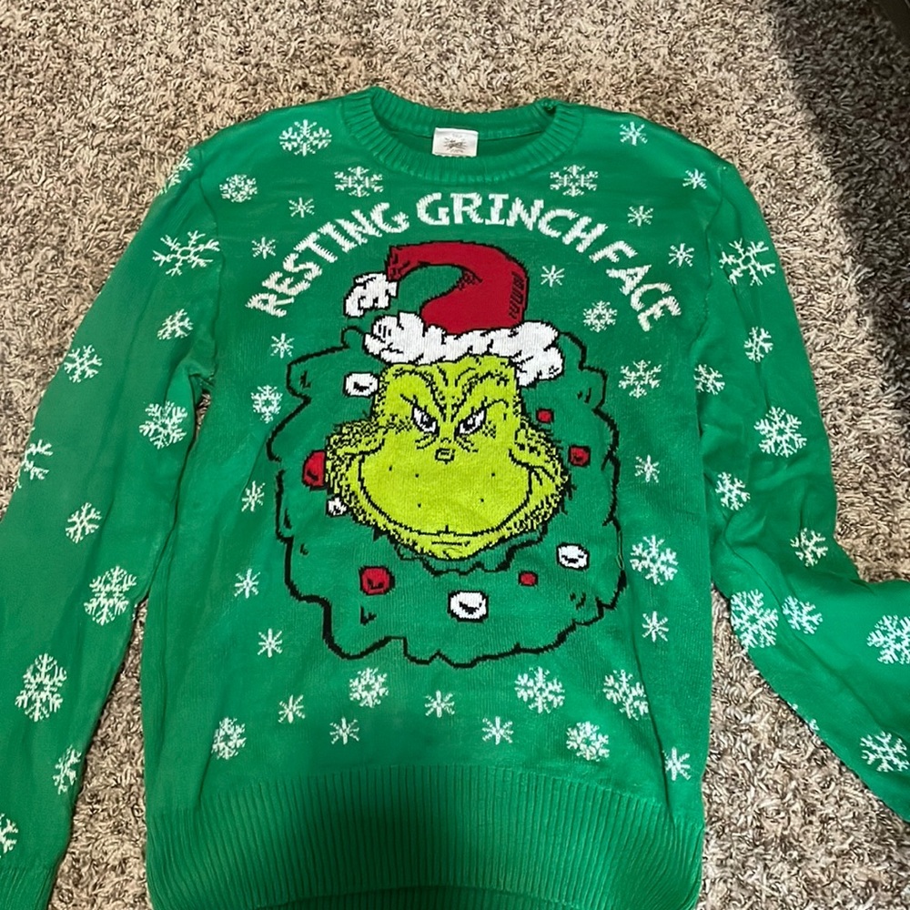 Green “Resting Grinch Face” sweater. Size: M